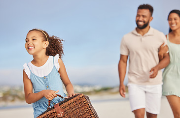 Image showing Happy family, parents or kid walking for beach picnic to relax on fun summer holiday vacation together. Excited dad and mother or excited young girl bonding, smiling or holding basket at seashore