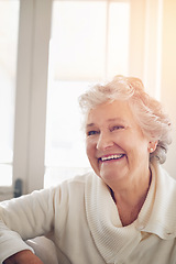 Image showing Relax, happy and face of old woman on sofa for free time, retirement and weekend. Smile, happiness and mindset with senior person in living room for elderly, positive and carefree resting at home