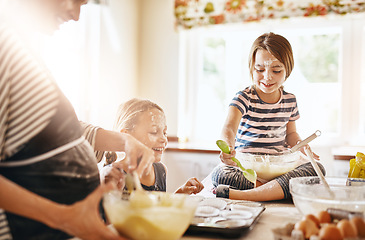 Image showing Mother, playing or happy kids baking in kitchen as a happy family with playful young siblings with flour. Dirty, messy or funny mom helping, cooking or teaching girls to bake for learning at home