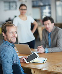 Image showing IT team, portrait or happy developers in meeting for discussion or brainstorming together in office. Diversity, digital app or programmers networking with technology, tablet or laptop in workplace