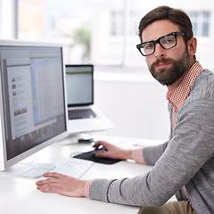 Image showing Business man, serious portrait and computer coding of a IT professional at an office desk. Typing, cyber company and digital website design of an employee with pc technology at a startup workplace