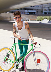 Image showing Man, hipster fashion and portrait with bicycle outdoor in sunshine with unique personality, sunglasses and cool style. Young gen z guy, funky attitude and bike in summer, urban city and trendy person