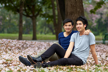 Image showing Gay, Asian men and couple in park, nature date and life together with homosexual, pride and happiness. Young male people relax outdoor in Korea, LGBT and romance with trust in relationship and love