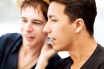 Image showing Thinking, phone call and friends listening to a conversation, communication or audio message. Idea, online and men with a mobile to listen to a person speaking on an app or together in the city