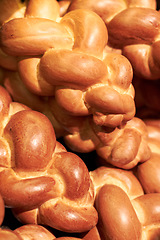 Image showing Above, bakery and closeup of fresh bread for breakfast, lunch or dinner. Diet, healthy and baked food, baguette rolls and buns in the kitchen for a homemade snack or carbs from a cafe or restaurant