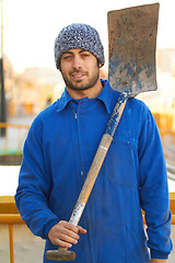 Image showing Portrait, shovel and a man construction worker on a building site for manual labor on a development project. Industrial, builder and maintenance with a professional engineer or contractor outdoor