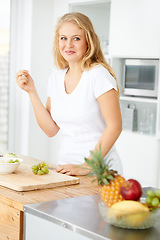 Image showing Fruits, eating grapes or woman thinking of a snack, morning meal or healthy lunch diet in home kitchen. Breakfast idea, vegan or happy girl with fruit salad or food bowl to lose weight for wellness