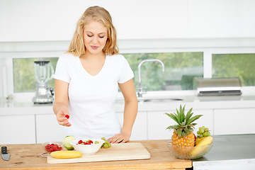 Image showing Fruit salad, eating berries or woman with a snack, morning breakfast or lunch diet in home kitchen. Meal, gut health or happy vegan girl with fruits, grapes or food bowl to lose weight for wellness