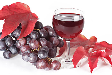 Image showing Red wine and grapes