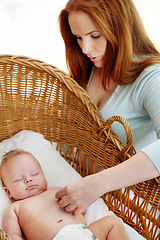 Image showing Woman, baby sleeping and home bedroom with morning nap, tired yawn and parent love in nursery. Newborn, mother and mama care with young child with mom in a house with childcare in bed with support