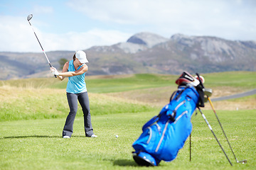 Image showing Driver, woman or golfer playing golf for fitness, workout or exercise with a swing on a green course. Wellness, girl golfing or athlete training in action or sports game driving with a club stroke