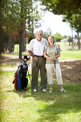 Image showing Happy old couple, portrait or golfers on course in fitness workout, exercise or round together on field. Embrace, healthy elderly man relaxing or smiling in golfing sports game with senior woman