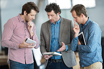 Image showing Tablet, team discussion or business people thinking of ideas in group meeting for brainstorming in office. Research, collaboration or developers talking or planning a project strategy in workplace