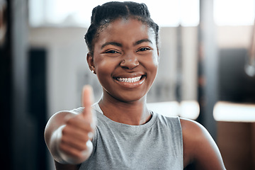 Image showing Fitness, portrait or happy black woman with thumbs up in gym training with positive mindset or motivation. Wellness, smile or healthy personal trainer in workout with a like hand gesture for support