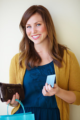 Image showing Happy, retail portrait and a woman after shopping, weekend sale and shop discount. Smile, confident and a young person with a bag from a store after a boutique deal or making a purchase on a wall