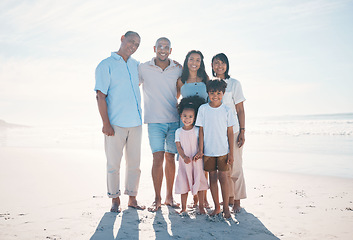 Image showing Travel, beach and portrait of happy family with grandparents at the sea or ocean for love, care and happiness. Happy, sun and parents with children or kids bonding on a holiday for freedom on sand