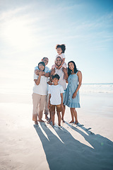 Image showing Vacation, beach and portrait of happy family together at the sea or ocean bonding for love, care and happiness. Happy, sun and parents with children or kids and grandparents on a holiday for freedom