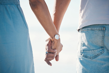 Image showing Couple, holding hands and love outdoor with trust, comfort and hope, empathy and kindness. Together, support and man with woman for family, solidarity and bond, loyalty and marriage commitment