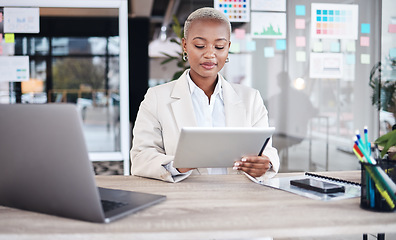 Image showing Laptop, business and black woman in office on tablet for research, website and browse internet. Corporate, connection and female person on digital tech working on online project, report and review