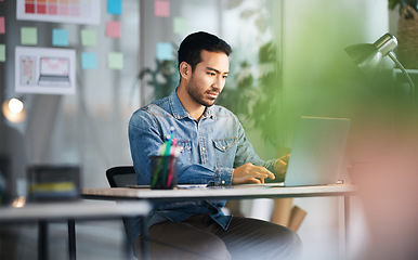 Image showing Thinking, typing and man at desk with laptop, ideas and research planning at design agency. Business, work and computer, employee in office reading email or online report in creative startup career.