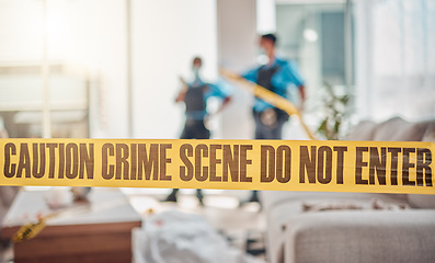 Image showing Tape, crime scene and police in house for investigation, inspection and forensic analysis. Law enforcement, safety and security people in living room for criminal, murder and searching for evidence