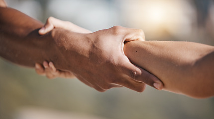 Image showing People, holding hands and pull arm for teamwork, solidarity and trust for safety, training or exercise in nature. Team, support and helping for kindness, strong and care with fitness, workout or goal