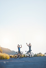 Image showing Mountain, celebration and male athletes cycling on bicycles training for race or marathon in nature. Sports, fitness and men cyclists cheering while riding bike for cardio exercise on outdoor trail.