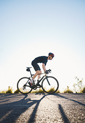 Image showing Mountain, fitness and man athlete on bicycle cycling training for a race or marathon in nature. Sports, workout and male cyclist riding a bike for cardio exercise on an outdoor off road trail.