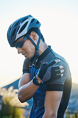 Image showing Man, cycling and injury with muscle pain in shoulder, arm or stress with helmet for safety, fitness or exercise. Cyclist, emergency and medical problem in countryside for workout, race or performance