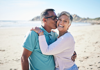 Image showing Beach, kiss and portrait of senior couple for bonding, quality time and relax in nature. Love, retirement and happy elderly man and woman embrace by ocean on holiday, vacation and travel in morning