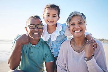 Image showing Beach, happy and portrait of grandparents with child for bonding, quality time and relax in nature. Family, love and happy grandfather and grandma with girl by ocean on holiday, vacation and travel