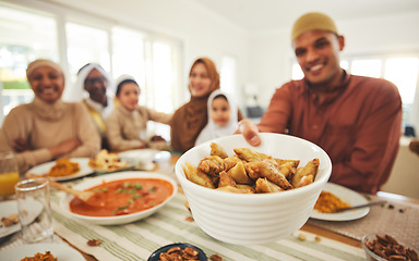 Image showing Food, offer and muslim with big family at table for eid mubarak, Islamic celebration and lunch. Ramadan festival, culture and iftar with people eating at home for fasting, islam and religion holiday