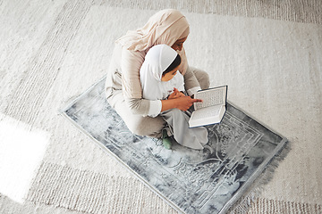 Image showing Quran, Muslim kid and parent on floor reading, learning and help girl with religion prayer, study and faith in Allah. Knowledge books, home top view or person teach child worship, praying and respect