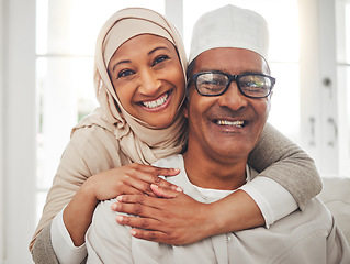 Image showing Portrait, Muslim and elderly couple smile, hug and happy for support, trust and care in retirement, bonding or marriage. Face, home and Islamic man, woman and elderly people together for quality time