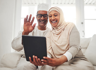 Image showing Tablet video call, Islamic and elderly couple smile, wave hello and speaking on online communication, chat or talk. Contact, Muslim home and senior man, woman and people happy on virtual conversation