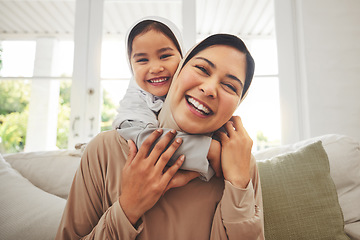 Image showing Portrait, hug and muslim mother, happy child or family bonding, laugh and enjoy quality time together. Living room sofa, happiness and face of Islamic mom, youth kid or Arabic people embrace at home