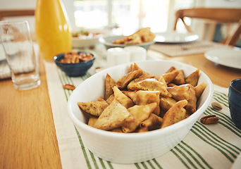 Image showing Food, Eid Mubarak and samosa for family at table for Islamic celebration, festival and lunch together. Ramadan, religion and closeup of meal, dish and cuisine for fasting end, holiday and culture