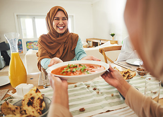 Image showing Food, smile and muslim with family at table for eid mubarak, Islamic celebration and lunch. Ramadan festival, culture and iftar with people eating at home for fasting, islam and religion holiday