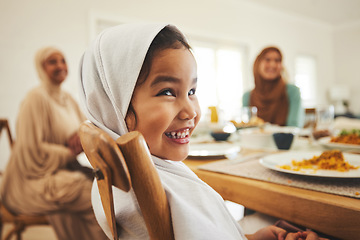 Image showing Food, muslim and child with big family at table for eid mubarak, Islamic celebration and lunch. Ramadan festival, culture and iftar with people eating at home for fasting, islam and religion holiday