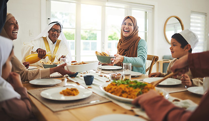 Image showing Food, funny and muslim with big family at table for eid mubarak, Islamic celebration and lunch. Ramadan festival, culture and iftar with people laughing at home for fasting, islam or religion holiday