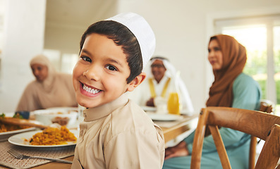 Image showing Food, portrait and child with big family and muslim holiday for eid mubarak, Islamic celebration and lunch. Ramadan festival, culture and iftar with people at home for fasting, islam and religion