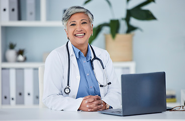 Image showing Doctor, happy portrait and woman in office for medical consultation, support and services planning or advice. Face of healthcare worker or senior person on laptop of health insurance or online clinic