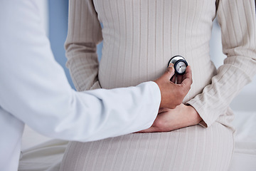 Image showing Pregnant, woman and hands of doctor in exam for pregnancy checkup, tummy or patient at the hospital. Female person, medical or healthcare professional checking stomach in maternity at the clinic