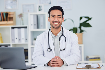 Image showing Doctor, portrait and man in healthcare office for consultation, support and services with management and insurance. Happy face of medical worker or asian person consulting in clinic or hospital