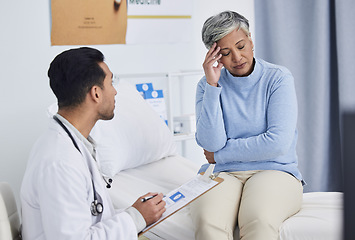 Image showing Pain, headache and doctor with patient support, clipboard and healthcare exam or consultation in hospital. Tired, stress and senior woman with medical professional writing notes, helping and advice