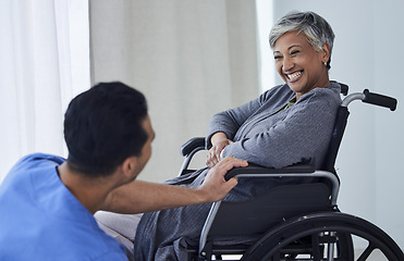 Image showing Doctor, wheelchair and happy woman with support, healthcare service and medical kindness or nursing. Nurse, caregiver and people laugh or senior patient with disability, consulting or helping at home