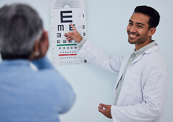 Image showing Happy asian man, doctor and eye exam with patient for testing vision, sight or consultation at the hospital. Male person, medical or healthcare professional consulting or helping client with eyesight