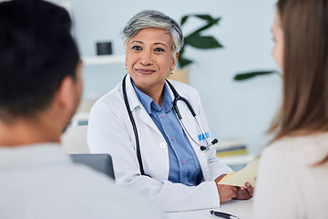 Image showing Senior woman, doctor and couple in consultation for healthcare advice or life insurance at hospital. Happy mature female person or medical professional in meeting, discussion or consulting patients