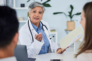 Image showing Senior woman, doctor and couple for life insurance, consultation or healthcare advice at the hospital. Happy mature female person or medical professional in meeting, discussion or consulting patients