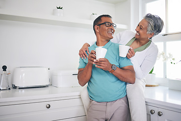 Image showing Love, coffee and happy with old couple in kitchen, for morning, relax and hug. Happiness, smile and peace with senior man and woman drinking tea at home for conversation, wake up and embrace